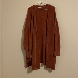 Cardigan rust orange in color heavy and thick